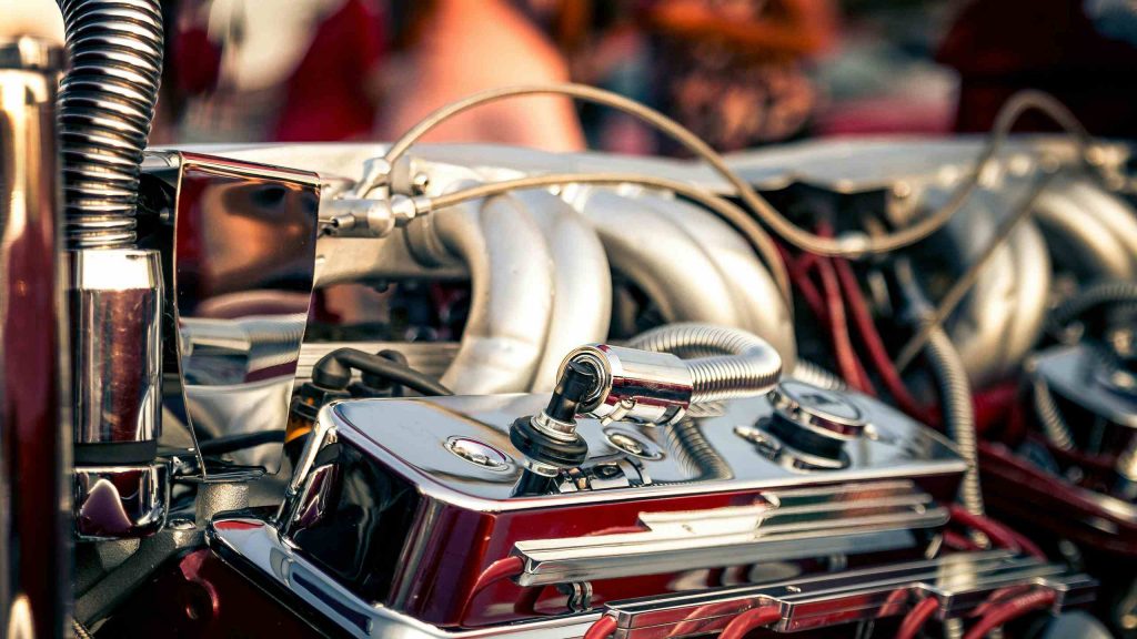 Detailaufnahme eines hochglanzpolierten Motors – steht symbolisch für die innovative Messtechnik und Präzisionslösungen des Unternehmens Imes.