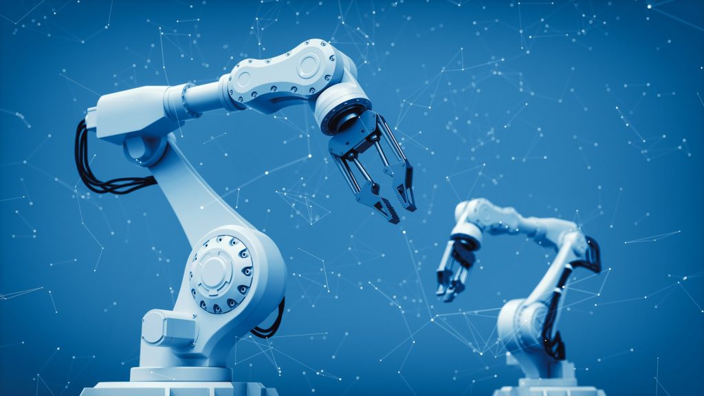 Zwei vernetzte Industrieroboter symbolisieren den Einsatz von KI in Wertschöpfungsketten zur Automatisierung, Prozessoptimierung und intelligenten Steuerung industrieller Abläufe.